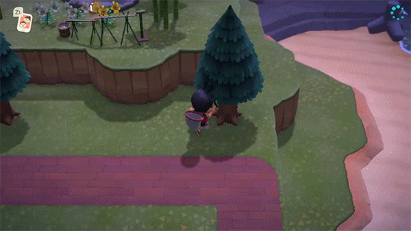 Un personaje de Animal Crossing arranca un nido de avispas de un árbol, pero las recoge en una red